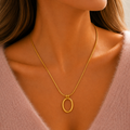 Gold Oval Pendant Necklace